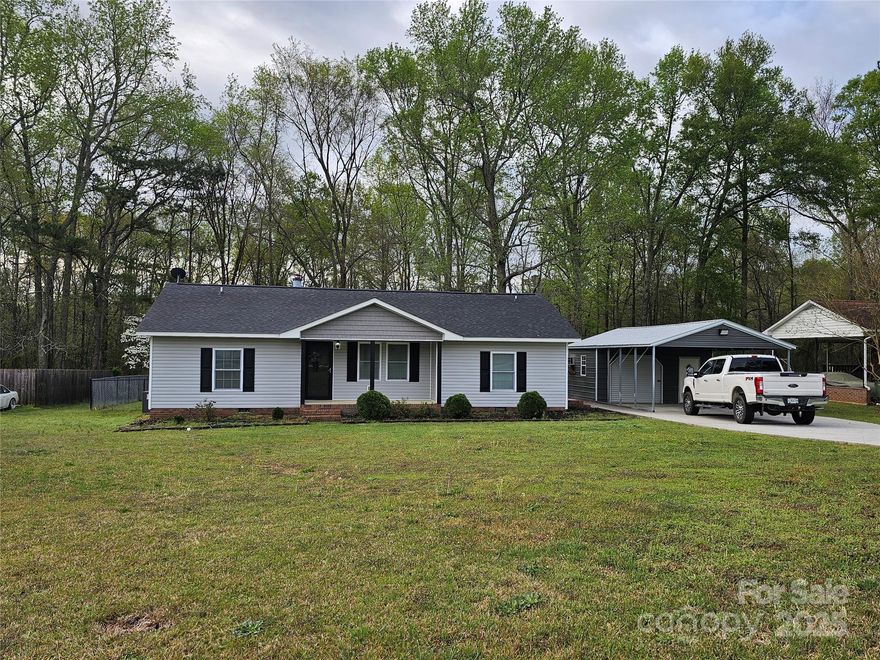 Home is back on the market at no fault of the Seller.  So, here's your chance to come and enjoy all this home has to offer.  Split floor plan, home has 3 bedroom, 2 full baths. Large living room with fireplace, dining area, sliding glass doors that lead to a screen porch. Fenced back yard. Storage building in back yard and also large storage building at side that's wired and have HVAC window unity.