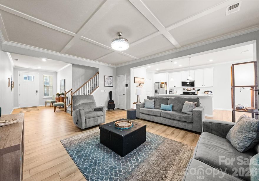 Welcome to 8134 Merryvale Lane, a beautifully maintained 3-bedroom, 2.5-bath townhome nestled in the highly sought after Vineyards community near Lake Wylie.

Designed with comfort and style in mind, this bright and airy home includes tons of natural light throughout the open concept main living area. The stunning kitchen is complete with a large island, granite countertops, stainless steel appliances, and exceptional storage. The adjacent dining area provides ample seating and flows seamlessly to your private, fenced backyard oasis — enhanced with a paver patio, perfect for relaxing or entertaining.

Upstairs, the primary suite showcases an oversized shower, double vanity, and an impressive walk-in closet. The laundry room conveniently connects to both the primary closet and the common hallway for everyday ease. Two additional secondary bedrooms, a full bathroom, and a spacious loft area complete the upper level, offering flexibility for guests, work, or play.

Ideally positioned within the community for added peace and privacy, this townhome also includes access to Lake Wylie and an array of resort-style amenities. The Vineyards offers lake access, a community boat ramp, walking trails, two outdoor pools, a fitness center, pickleball courts, outdoor grilling areas, a dog park, playground, and more. Boat slips, a storage lot, and kayak launch are available for a fee (pending availability).