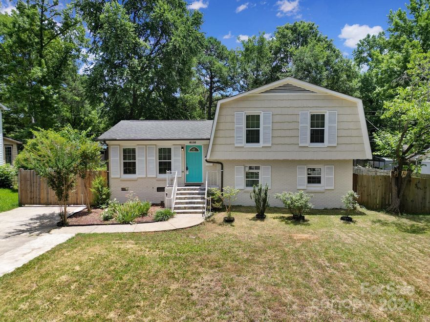Lovely split level home nestled in the Eastway neighborhood.  Spacious layout includes a formal living room and a family room on the ground level providing plenty of entertaining and dining spaces.  Top floor includes three bedrooms with the primary suite having direct access to the bathroom.  Bonus fourth bedroom and bathroom are on the ground level.  Oversized and flat backyard with a large covered porch.  Newer roof and HVAC installed in the home make this a great option.  Located close to NoDa and Plaza Midwood with a short commute to Uptown Charlotte.