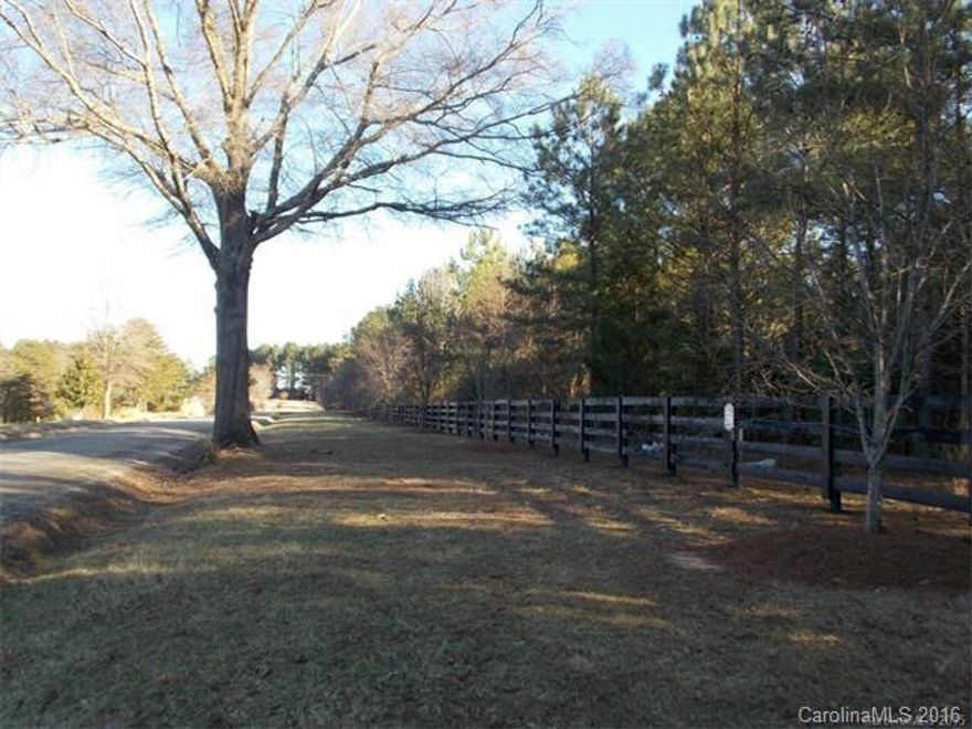 Wooded 5.29 acre lot available in a Growing area with an HOA. Restrictions on building. This lot is private and off a gravel road off of highway 49. (additional acreage is available next to the lot, see lot 49/50 ) Builder is available. Take a drive down Mckinney road.