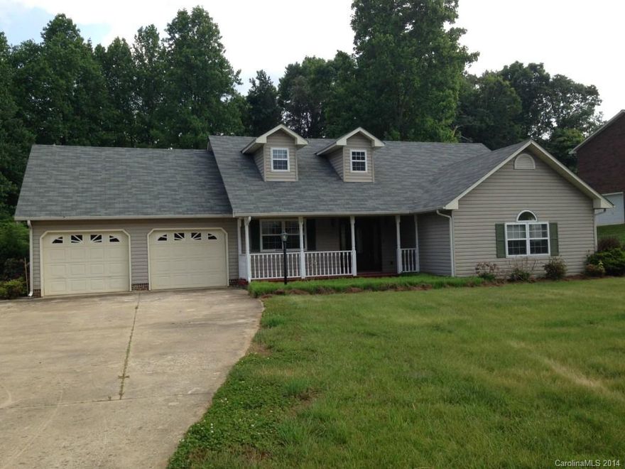 Large 1. 62 acres with fenced back yard, deck and outbuilding. Spacious home with 3 bedrooms on the main level, Large eat in kitchen with separate dining room. Upstairs has full bathroom and large bonus room.  Large family home!