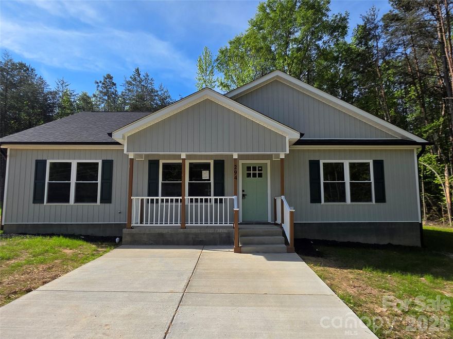 BRAND NEW HOME!  This cozy 1596 sq ft, single story, virtually staged, 3br 2 ba, that sits on 1.67 +- acres and is located in a quiet, well established, community near the town of Clover.  With tall trees and a wooded area, you'll find privacy.  It is an all electric home.   The property is tastefully positioned to enjoy the proximity to downtown Clover, cafes, coffee shops, restaurants, shopping, and it offers a selection of great schools in South Carolina that the homeowner may be able to take advantage of.  It is approximately 45 minutes from Charlotte Douglas Airport.  It is close to Charlotte, Rock Hill, Fort Mill, Gaffney, SC and its outlet mall.  This would be a very good purchase for someone who may be just starting a family, or is looking to downsize.  If requested, the Seller has agreed to clear additional land that is on the property for an acceptable offer.  Come see it TODAY!