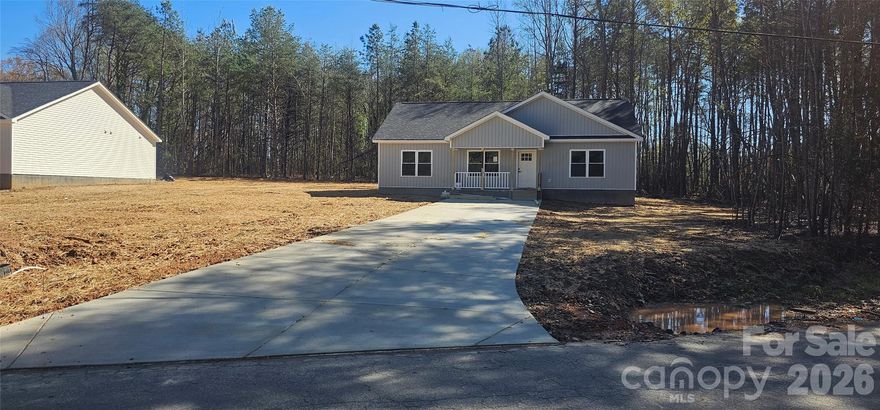 BRAND NEW HOME!  This cozy 1500 plus sq ft, single story, virtually staged, 3br 2 ba, home sits quietly in a well established, older neighborhood in the town of Clover.  With tall trees and a wooded area, you'll find privacy.  It is an all electric home.   The property is tastefully positioned to enjoy the proximity to downtown Clover, cafes, coffee shops, restaurants, shopping, and it offers a selection of great schools in South Carolina that the homeowner may be able to take advantage of.  It is approximately 45 minutes from Charlotte Douglas Airport.  It is close to Charlotte, Rock Hill, Fort Mill, Gaffney, SC and its outlet mall.  The anticipated completion date is in February 2026.  This is a very good purchase for someone who may be just starting a family, or is looking to downsize.  Buy it now before it's too late!