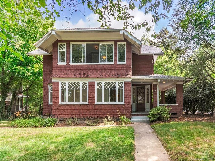 Montford Beauty awaiting your personal touches.  Enjoy your level lot surrounded by mature trees & private rear yard.  Sleeping porch, exquisite high ceilings, open floor plan, butler's pantry & natural light streaming through an abundance of windows.  Make this your dream of Montford living!