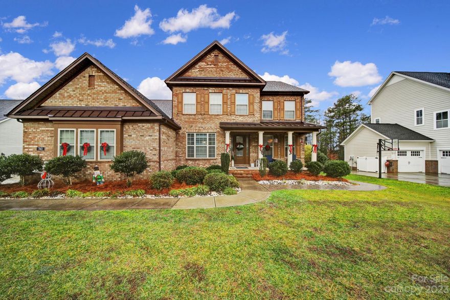 Stunning home with a primary suite on the main and heated pool with umbrella posts. Schedule your showing TODAY! This home will not last long. Two story home on a half acre with 4 bedrooms, office, dining, bonus room and loft. Main level open floor plan to a kitchen with granite counter tops, tile backsplash, stainless steel appliances, and  walk in pantry. Living room includes a fireplace, coffered ceiling, and a wall of windows. The primary suite includes a second walk in closet connecting to the laundry room. Also his and her vanities, tub, shower, bedroom overlooks the pool area. French doors to the office also includes a closet. Butlers pantry extends from the dining room to the kitchen. Sliding doors off the kitchen to a covered and uncovered deck to overlook the heated pool. Endless walk in storage off the bonus room. Drop zone by the garage entrance.  An entertainer's dream come true. Homeowner added the pavers to the backyard. Professional photos 12/26.