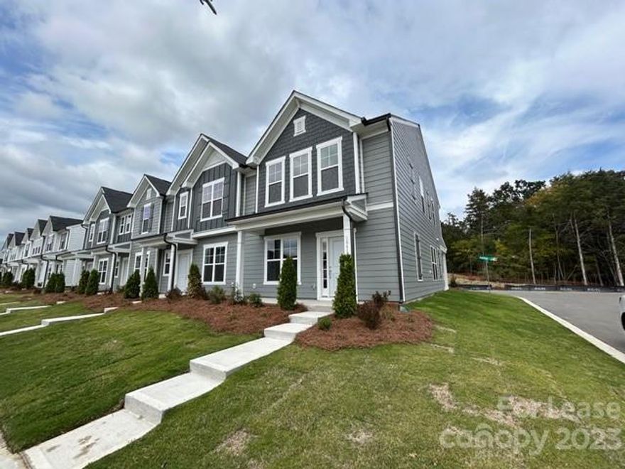 Be the first to live in this beautiful end- unit brand new townhome!  This two story 3 BR /2.5 BA home features an open floor plan with highly desired LVP flooring & tile on the main and cozy carpeting in the bedrooms.  The kitchen has a beautiful island for food prep and entertaining along with gorgeous granite  countertops.  You'll love the spacious primary bedroom with en suite and walk in closet.  The two guest bedrooms are generously sized leaving you with plenty of versatility and options.  Enjoy your morning coffee or relax after a day's work on your private back patio.  Convenient to I-485 and I-77, shopping centers, dining, and entertainment.  See it today because this one won't last!