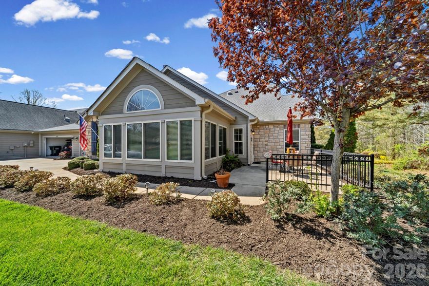 Welcome Home to this inviting luxury gated 55+ Polo Club of Mountain Island Lake — effortless living with lawn maintenance and irrigation, water and Sewer covered by the HOA. This beautiful end-unit has no full shared walls with neighbors and sits beside serene woods, offering a private patio with peaceful views—ideal for relaxing or entertaining. Beautiful hardwood floors complement a chef-ready kitchen with granite countertops and a seated bar, while above-average ceiling heights and a gas-log fireplace add warmth and style. Thoughtful extras include a security system, two-car garage, laundry room sink, abundant storage, and tube skylights that fill the home with natural light, neutral palate and nice trim details. The primary suite overlooks tranquil woods and boasts an exceptional bathroom with Hollywood vanity and a walk-in shower. Enjoy resort-style amenities — clubhouse, fitness center, and pool — and quick access to Riverbend shopping, Starbucks, Harris Teeter, First Watch, and more. Ideal for entertaining and easy living. Conveniently located with access to the beltloop 485, and Hwy 16 to Mountain Island Lake, Lake Norman, or Uptown Charlotte.