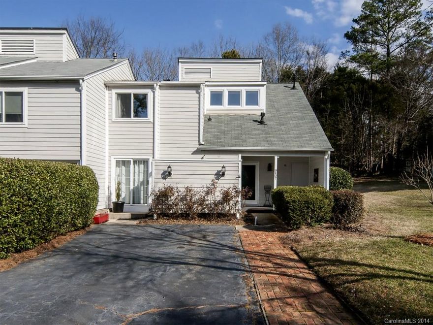 Great end unit/Priv setting/Long driveway for parking/2 sty foyer w/lrg windows makes this space light & bright/Energy efficient windows/Lrg kit w/brkfst & desk area (blt in desk & cabinets) & SS appl/Open, spacious versatile DR/LR w/gas fpl/Expansive MBR retreat w/2 walk-in closets, separate vanity & balcony/BA has some updates/Sev lrg closets offer grt storage/Screen prch/Outdoor strg