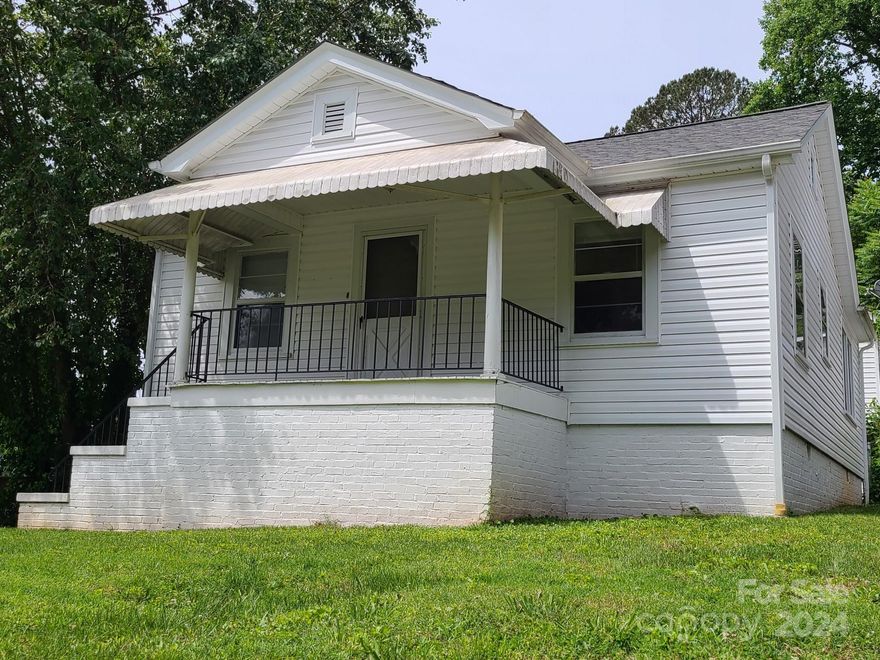 Charming single family home located at 530 Main St SW in Lenoir, NC, built in 1930. This cozy property features a spacious open living room-dining room area, 2 bedrooms including a walk-in closet off the large main bedroom, a convenient utility/mud room, and a bathroom. This home had an extensive remodeling 2 years ago.  Upgrades include, a new heat pump with heating and air conditioning, major upgrades to electrical and plumbing, new roof, and new vinyl siding on the entire house. Totally new flooring includes refinished hardwood flooring in bedrooms and living room, plus new LVP flooring in kitchen, bathroom, and utility room.  In addition, all interior rooms were repainted.  Perfect for a small family or as an investment property, this historic home offers character and potential in a convenient location. Don't miss the opportunity to make this gem your own!.