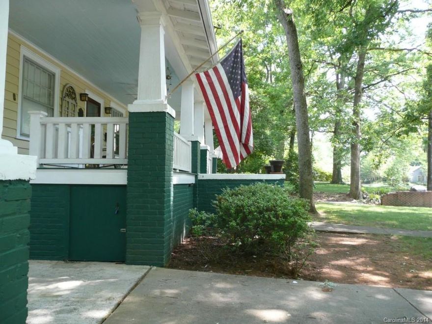 Located in the heart if the Plaza-Midwood Historic District, this classic bungalow features full front porch with porte-cochere style covered parking, just charming.  Large formal living and dining room, hardwood floors throughout.   French doors to front bedroom could be an awesome office.   The "quality" hardwood steps are in and inviting you to expand into the attic.  Private backyard with patio.(HDC  rules apply)