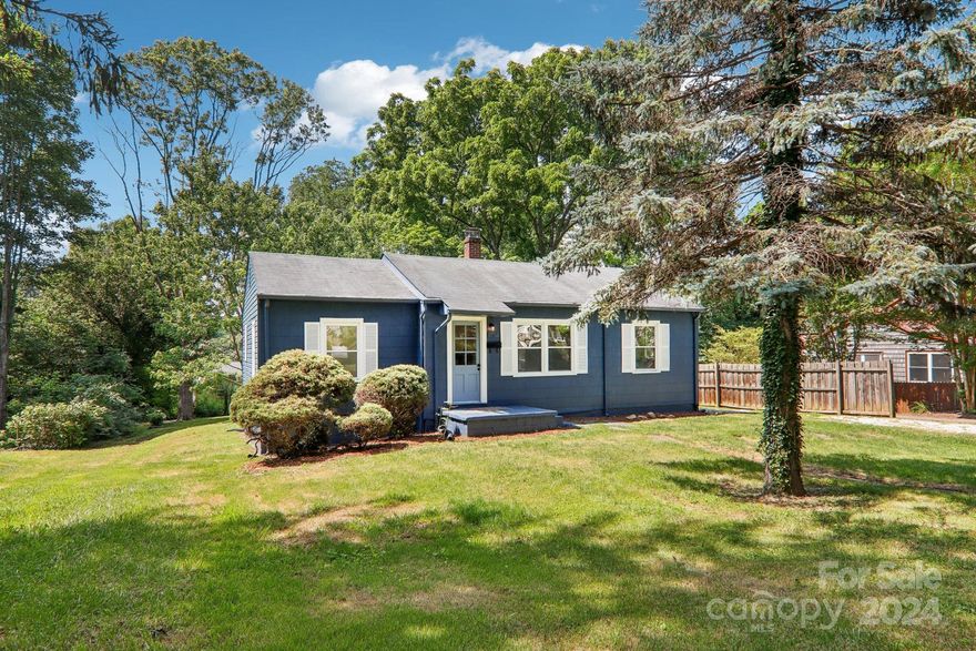 Check out this sweet spot in West Asheville, with great potential, for under $400,000. It's perfect for investment, starter home or empty nest with one level living, huge level lot and room to expand, or build ADU.  It has three bedroom - one bath with office/laundry room and many improvements, including 2024 HVAC heat pump, hot water heater, back deck and 200 amp electrical service upgrade. Kitchen and bathroom need updates. Bring your hammer and ideas. Walk to Haywood Road restaurants and shopping. It's one block from local elementary school. Sold as is.