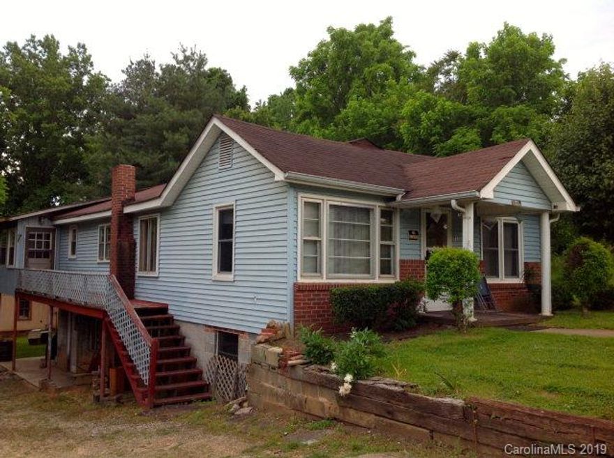 2 Bedroom house with updates including central air, some thermopile windows, siding, etc.  ---  living room, den, eat in kitchen --- full basement --- multiple lots totaling approx 1/2 acre  --- extra storage building/shed --- garden spot --- excellent location directly bordering the YMCA and greenway walking trail