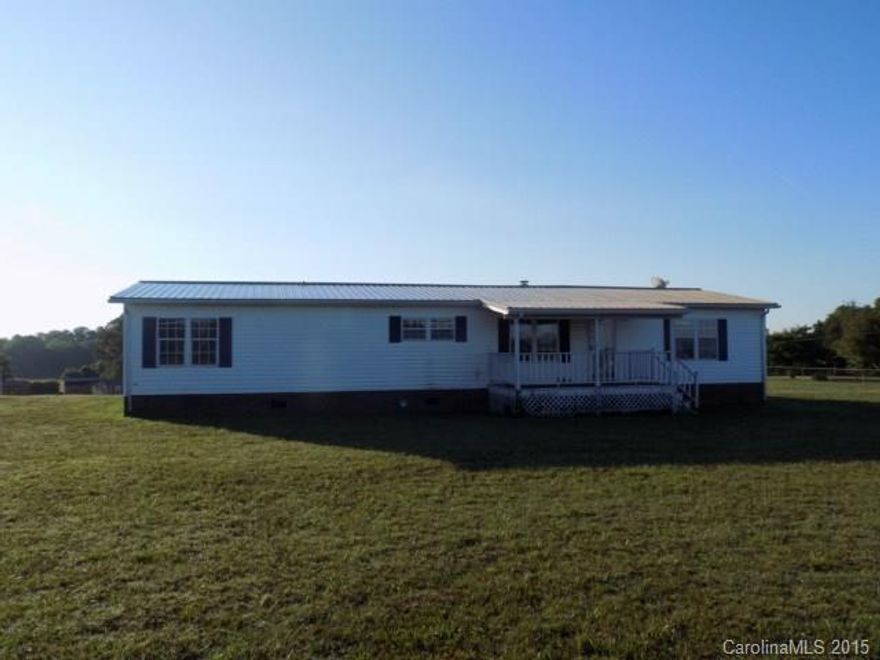 Lovely home with split BR floor plan. Home features large open living & dining areas. Living room is complete with FP; spacious kitchen offers plenty of cabinets & counter space with a kitchen island. The master bedroom suite has walk-in-closet, bath with double vanity, jetted tub & separate shower. Convenient to Hwy 74. Buyer/buyer's agent to verify all information.