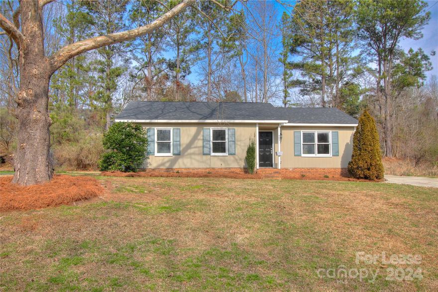 Updated cottage home nestled in the historic Hillcrest neighborhood of Waxhaw. Notable features include: New granite kitchen and cabinets, new stainless appliances, new vinyl plank flooring, new ceiling fans and light fixtures, new bathroom vanities, toilets, freshly painted, one-level floor plan, private lot. No HOA. Perfect balance of tranquility and convenience. Walking distance to quaint downtown Waxhaw's restaurants, shopping and new Downtown Park. With easy access to I-485, Blakeney, Ballantyne, Waverly and new Rea Farms area shopping districts. Top-rated Union County school district. Don't miss the chance to make this lovely house your new home! "Apply Now" on Zillow. *To protect against fraud, always confirm listing details with a licensed broker and/or the property manager directly. Do not rely on social media postings. We Verify and require a government issued ID and/or valid cell number to tour our properties. All showings must be scheduled.