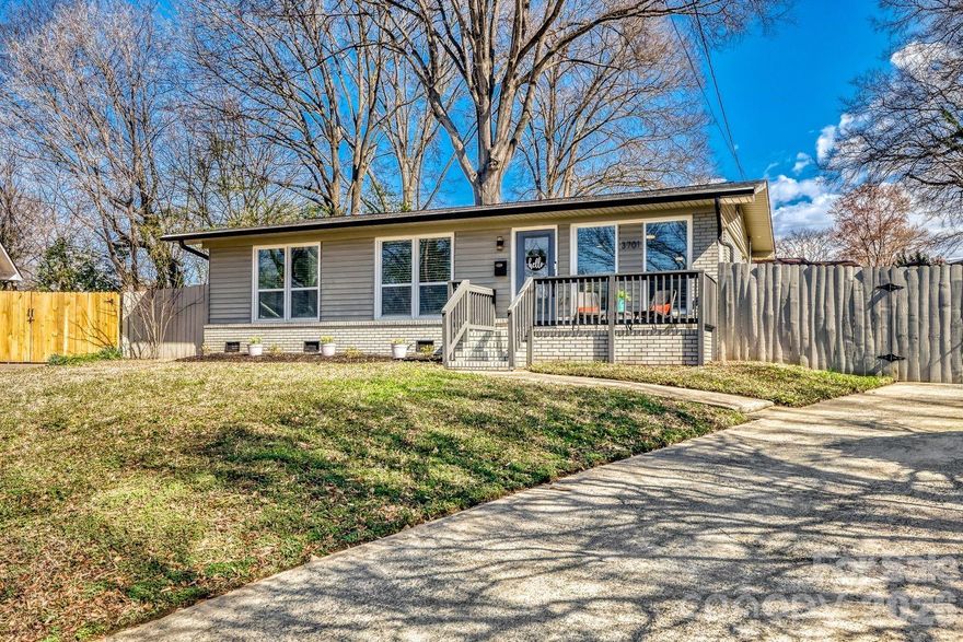 Welcome to 3701 Lynette Court in Charlotte’s thriving Clanton Park neighborhood, where modern design meets unbeatable location. Tucked away on a spacious cul-de-sac lot just minutes from LoSo, Revolution Park, and Uptown Charlotte, this fully remodeled 3-bedroom, 2-bath bungalow delivers style, function, and that hard-to-find Charlotte charm.

Renovated in 2022 from top to bottom, this home features laminate flooring throughout, designer lighting, and a sleek electric fireplace with multi-color flame feature that creates a striking focal point in the living room. The open layout flows effortlessly into the stunning kitchen showcasing quartz countertops, soft-close cabinetry, stainless steel appliances, subway tile backsplash, and updated fixtures that feel straight out of a design magazine.

Both bathrooms have been completely refreshed with designer tile, modern vanities, and updated plumbing fixtures, offering a clean, contemporary feel. Additional upgrades include new windows, architectural shingle roof, and thoughtfully designed laundry and pantry spaces that maximize storage and convenience.

Step outside and enjoy a fully fenced backyard with an expansive patio—perfect for entertaining, grilling, or simply relaxing under Carolina blue skies. The rare two-car detached garage is a standout feature in this area, offering ample parking, storage, or workshop potential. All of this sits on a generous cul-de-sac lot that provides privacy and room to spread out.

If you’ve been searching for a move-in ready home near LoSo’s breweries and restaurants, green space at Revolution Park, and a quick commute to Uptown Charlotte, this is the one. Stylish, updated, and in a location that keeps getting better—3701 Lynette Court is ready to impress.