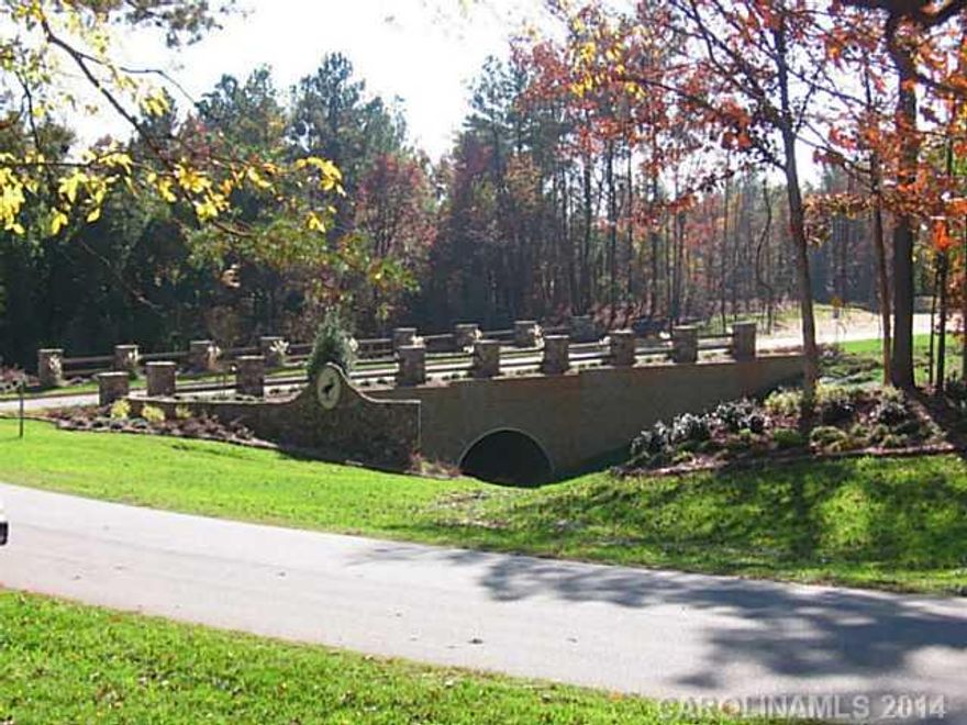 Heavily wooded cul-de-sac lot just around the corner from pool and cabana.  Buyer has 2 years to built.