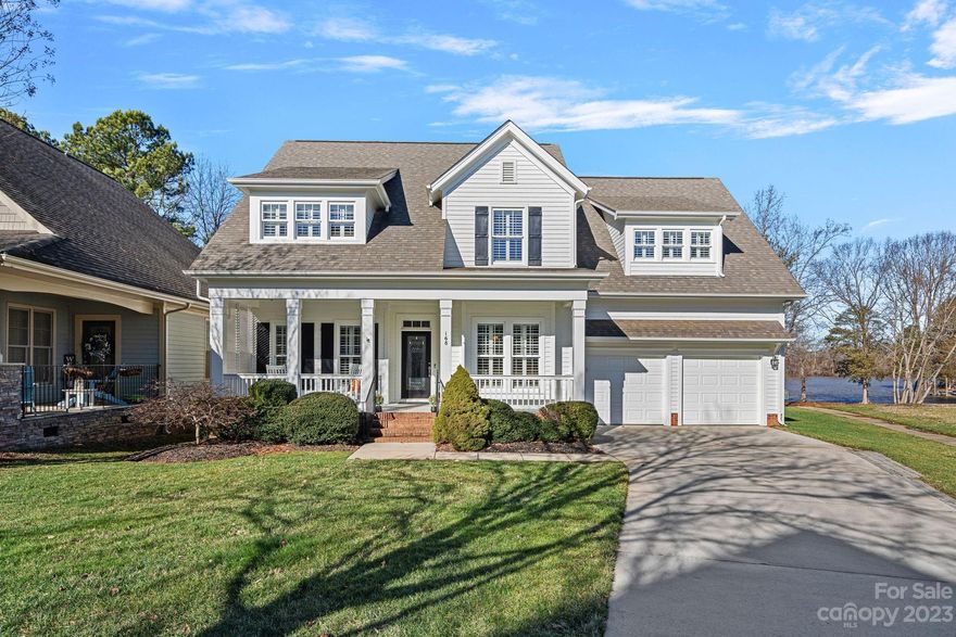 If you are looking for amazing lake views everyday, it is right here. Lake Davidson is the backdrop. Feel a part of nature, not the daily grind. Here the front porch is for coffee, cocktails, and conversations with your passing neighbors. Here the screen porch is your front row seat to the sunsets, passing herons, kayaks and paddleboarders.   Cozy nights or busy workdays all find equal place and space here. The updated kitchen performs and shines for you simultaneously. From the breakfast table enjoy misty views of the lake as it wakes up just as dawn breaks. Upstairs you will find space to create, exercise, craft, and play. This home is packed with storage space too.  Highlight reel of updates: flooring |exterior/interior paint |water heater |HVAC| lighting| kitchen | primary bath| deck | garage floor. Amenities in this enchanting neighborhood include a pool, cabana, frisbee golf, private waterfront park. Kayak/canoe storage/ walking trails.  Minutes from quaint Downtown Davidson.