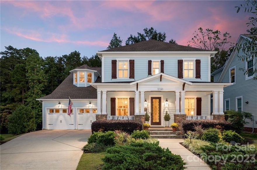 Impeccable, finely finished home on fabulous Morris Hunt Drive in cul-de-sac. Private rear yard w/HOA woods behind & no trail, for amazing privacy from large deck. Open floor plan with primary BRM on main level lives very elegantly. So many upgraded features and finishes separate this home from many in Baxter Village. Features include gleaming wood flooring on both levels, tiled baths, granite and marble counters throughout in the kitchen, baths and laundry, a dramatic two-story great room, white and gray cabinets in the kitchen with white in the baths and laundry, updated lighting and fixtures throughout, automated blinds in the primary BRM. Nicely finished mudroom and laundry too. Upper BRM cabinetry can easily be removed. Baxter Village is amazing community offering two club houses (available to rent), two pools, 30 pocket parks, four playgrounds, 12 miles of trails connected to Carolina Thread Trail, two tennis courts. WOW you can have fun & be active! Live the Baxter Village life!