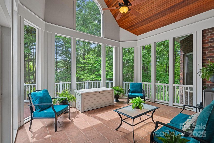 If you've been searching for a home that combines thoughtful design and room to truly live, THIS is the ONE! Tucked into a beautiful, tree-lined setting in sought-after Fort Mill, this 5 Bed, 3-bath ALL Brick beauty brings together warmth, space & functonality in all the right ways. An open, airy layout that flows effortlessly from room to room. The Dining & Living areas are perfect for cozy nights in or hosting friends & family. Kitchen has gorgeous wood cabinets, pull-out pantry shelves, new quartz countertops, SS range & microwave, & Sunny Breakfast nook w/its wall of windows. MAIN level, a spacious & peaceful Primary Suite w/private bath, plus a generous Guest bedrm. Hardwood floors & luxury laminate add a touch of warmth throughout. Upstairs, 3 more spacious bedrms, walk in closets & a 300+ sq ft Bonus Rm (playroom, media room, hobby room).  But the real magic? The Screened-in porch w/ vaulted wood ceiling. Perfect place to unwind! Glass of wine, or just a good book and a breeze.