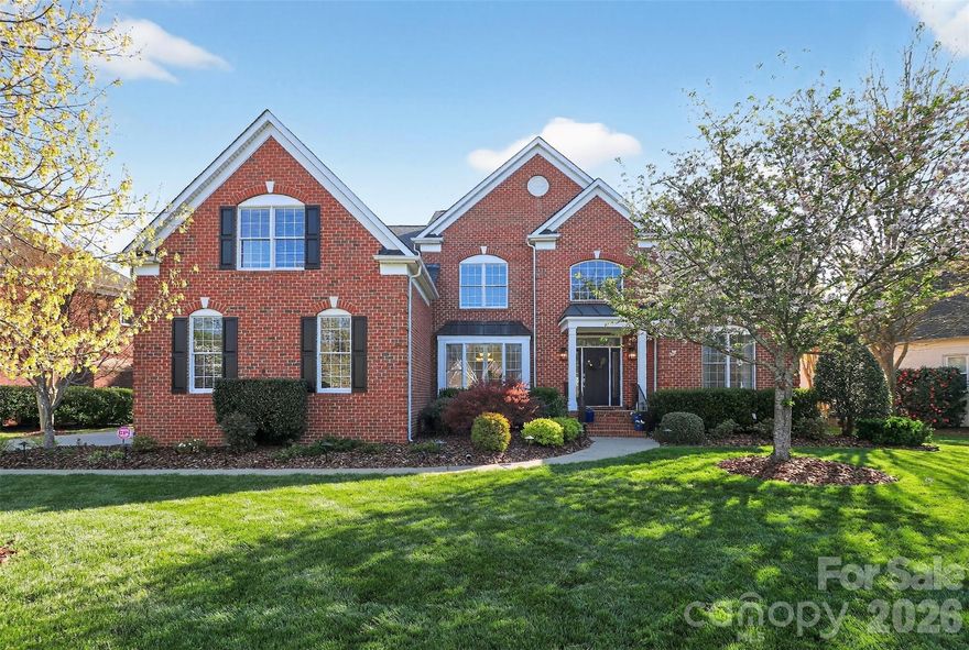 An elegant all brick home in the coveted Country Club Estates, this 4,200 square foot residence comes with 0.36 acre of impeccable landscaping. Thoughtfully updated and meticulously maintained by the original owner, the home offers timeless architecture paired with refined comfort.
A top feature is the main level primary retreat complemented by a spa-style bath that includes a large all-tile shower and stand-alone soaking tub. The main level focal point is the dramatic fireplace in the Great Room that is framed on each side by two-story picture windows revealing the lush backyard landscape. The Great Room flows seamlessly into the large kitchen and also connects with the breakfast nook. A Living Room with ample seating and built-in bookcases completes the main level.
The upper level features a bedroom large enough to serve as a second primary, another bedroom with an ensuite, and the third bedroom. A loft area is perfect for either another study, a media room, or a home office. The main laundry room is conveniently located on the second floor, with a secondary laundry space in the first-floor mud room. A three car garage with generous storage and new epoxy flooring, and the modern convenience of Google Fiber embodies luxury living combined with everyday comfort. Ideally located near Waverly’s shopping, dining, and medical destinations, this home embodies enduring elegance and ease.
Showings begin Thursday, April 16, 2026.