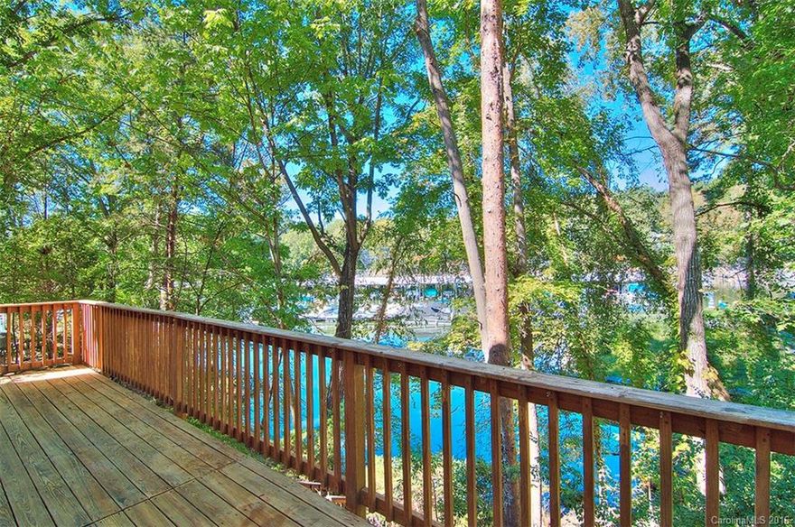 Don't miss this one!  True waterfront, facing marina, cul-de-sac, great yard! Charming 3 bedroom/1.5 bath home in authentic Tega Cay. Bring your kayak and paddle board! Steel siding. New roof '08. New paint, new HVAC & water heater. Kitchen w tile counters & backsplash. Custom cabinets & center work island. All appliances convey. Vaulted ceiling great room w fireplace, 2 decks. All the amenities that living in Tega Cay has to offer - golf, tennis, playgrounds, walking trails. Fort Mill Schools.