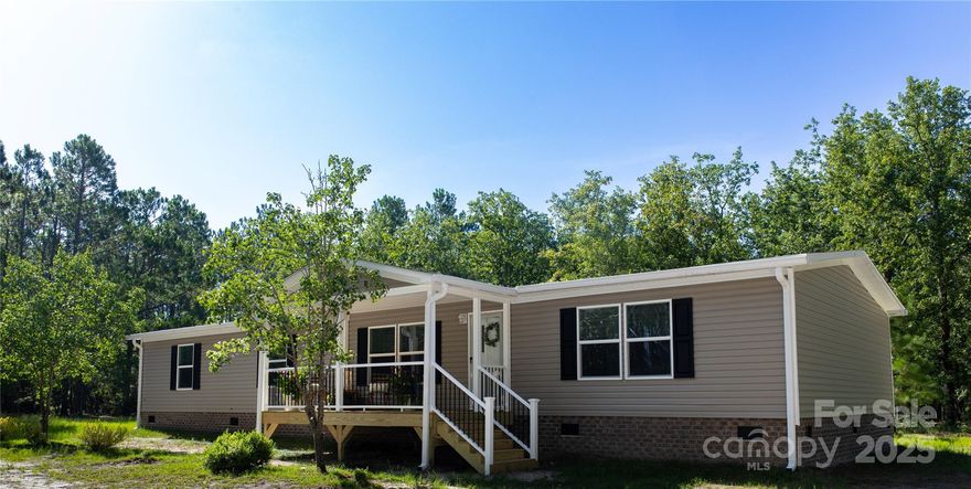 Ready to escape the hustle and bustle and embrace tranquil living?  Situated on NINE beautiful, private, secluded acres featuring a brand new 2024 Clayton Pride, this one has it all!!!  Need room for everyone?  This home has 4 bedrooms, 2 bathrooms, a formal living room, and a secondary family room with almost 1,800 square feet of living space.  Enjoy peaceful mornings and sunset evenings from your 8x16 covered front porch or your 8x10 rear deck overlooking this vast property.  Dreaming of a pool, four-wheeler trails, a hobby farm with livestock, a garden, or a garage/shop?  This land offers space for all of the above.  Your well-appointed kitchen includes all appliances (electric range, refrigerator, and dishwasher) and features a large island.  Do you envision hosting holiday gatherings for your friends and family?  The open floor plan is an entertainer's dream.  End your days by soaking the stresses way in your primary garden tub.  Buyer covered by one year manufacturer's warranty!