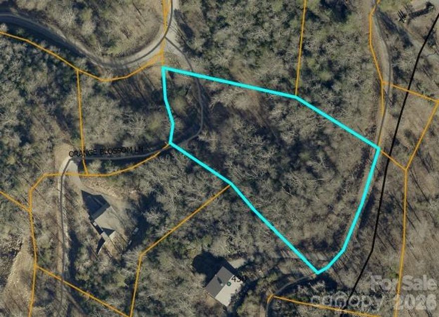 Gated community; lot has great views; ready to build your mountain home getaway!