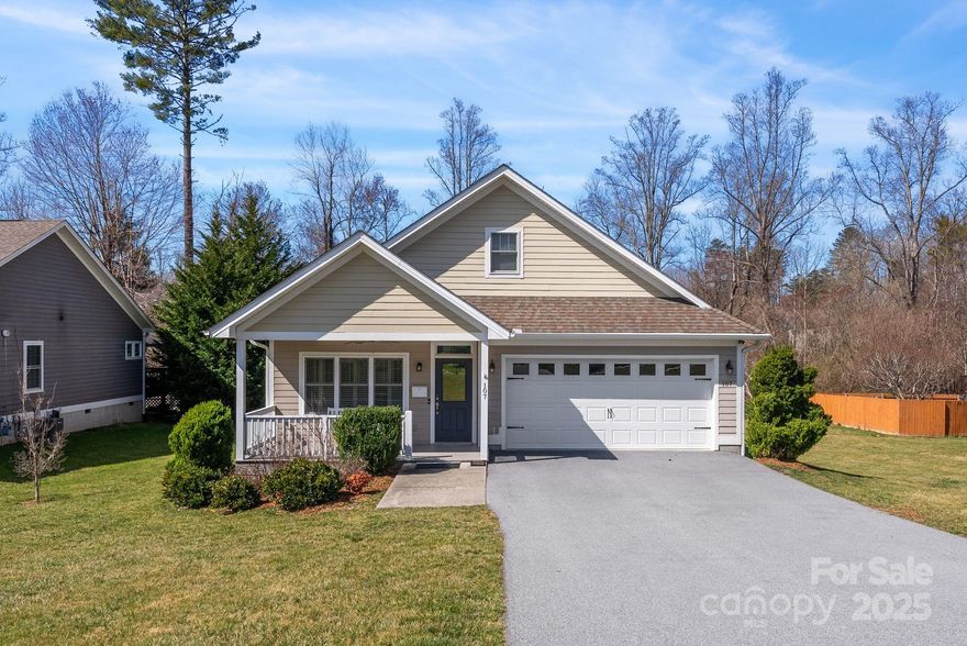 Located in the desirable Cottages of Fox Glen in Fletcher, this beautifully updated home is freshly painted & move-in ready. It features an open floor plan with cozy gas log fireplace, along with a spacious sunroom that converts into a "screened porch feel" with sliding windows. A large deck extends the outdoor living space, & the fully fenced backyard is perfect for pets. Designed with accessibility in mind, this home features a wheelchair-friendly layout with wide doorways, step-free entry, & smooth transitions between rooms for easy navigation. Additional upgrades include a hardwired security system, HD camera doorbell, smart smoke detector, Ecobee thermostat, & Samsung SmartThings hub with sensors. The home is "storage rich" & includes a floored storage area above the garage. Enjoy access to fantastic community amenities, including a clubhouse, pool, fitness center, & LAWN MAINTENANCE INCLUDED in your low HOA fee. Listings on this street are rare - see it today!