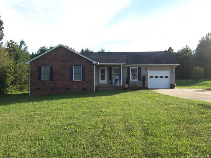 Gorgeous, open floor plan, decorator colors, hardwoods, ceramic tile, rocking chair front porch, large deck, lots of storage. Rare find.