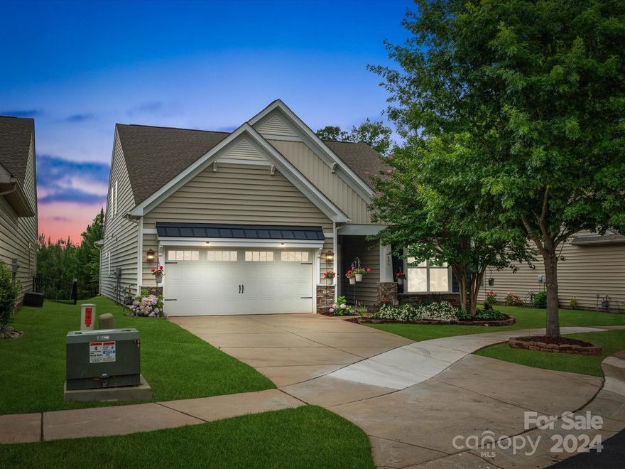 Tucked away on a peaceful cul-de-sac, this charming home offers backyard privacy overlooking trees. Gorgeous kitchen is filled w/custom upgrades from beautiful cabinetry, expansive pantry shelving, elegant light fixtures, spacious granite island & gas stove. Custom details continue into generously sized eat-in kitchen featuring gorgeous trim & built-in bookshelf. Spacious primary located on main level w/ensuite bathroom & oversized walk-in closet. Addt'l BR located on main plus a full bath w/upgraded tile. Laundry room boasts custom cabinetry for storage. Upstairs you'll find a 3rd BR, full bathroom plus a bonus/flex room that could be transformed into 4th BR. Walk-in attic storage. Plantation shutters. Enjoy natural light in the 3-season room featuring high quality Pella windows & shades. Step out to a travertine patio w/built-in gas grill ready for summer barbecues. Located within walking distance of community clubhouse, pool, fitness center, playground & tennis/pickleball courts.