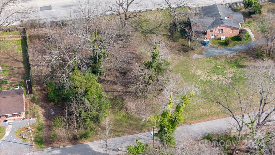 This partially cleared land is conveniently situated near downtown Rock Hill, Winthrop University and just minutes from I77. It offers the perfect opportunity to build your dream home property or a spec home to sell! With its proximity to these key areas, you'll have easy access to amenities and attractions! Modular home approved and city utilities available once tapped in!