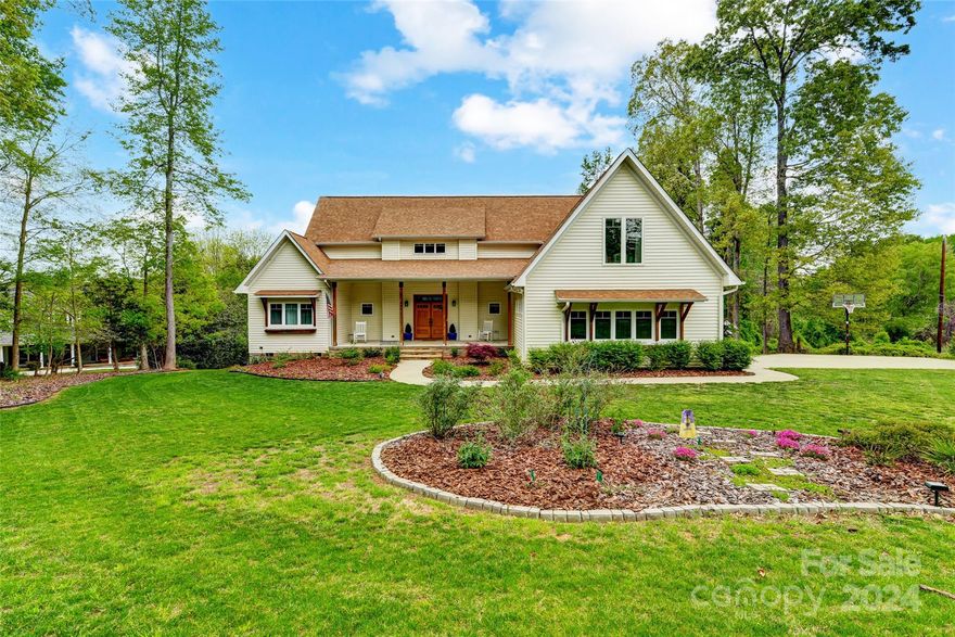STUNNING custom-built Lake Wylie waterfront home on 1 acre lot!  Live outdoors on the rocking chair front porch, 3 seasons room, massive deck, Gunite saltwater pool, or floating dock. You’ll love the bright & open floor plan that is perfect for entertaining. Spacious vaulted Great room w/ fireplace opens to sunroom where you’ll spend hours relaxing & enjoying the serene lake views. Engage your inner chef in the gourmet kitchen w/ leathered granite counters, SS appliances, large center island, pantry, & dining area.  Main level Primary suite features huge walk-in closet, dual vanities, & walk-in tile shower. Home Office plus 2 additional Bedrooms complete main level. Upper level boasts bonus/flex room perfect for 2nd office, guests, exercise, or rec room. Partially fenced yard is spacious, beautifully landscaped, & private.  Detached shed & walk in storage room next to pool ready for all your lake & pool toys.  Award-winning Clover School, SC taxes, convenient to restaurants & shopping.