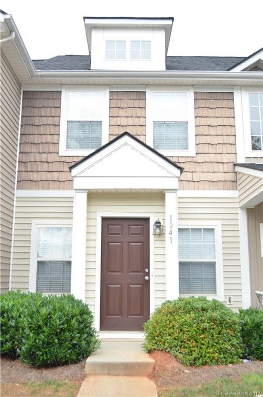 2 bedroom 2.5 bath townhome with 2 master bedrooms upstairs. Recently updated with new flooring, granite counter-tops and tile backsplash.