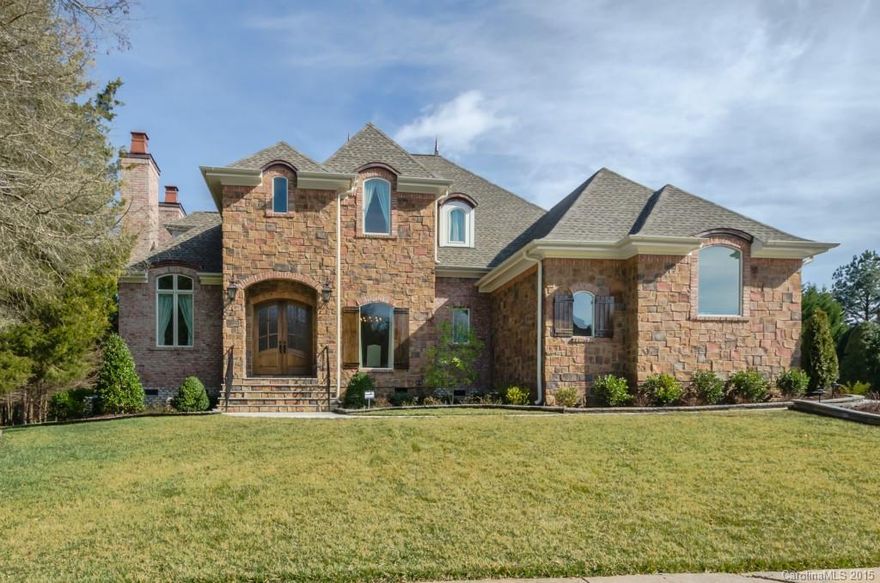 Builders personal custom home w beautiful architechtural details throughout.  Heavy molding, arched doorways, hand rubbed wood floors, sparkling chandeliers, custom drapes, built-in bookcases.  Gorgeous Chef's Kitchen w Wolf gas stove, custom cabinets w glass inserts, huge island, quartz counters, pot filler, designer backsplash.  Custom closet organizers in all BR's.  Media Rm., covered Porch w FP & gas grill, sprinkler system,
gas lamps at entry. 4 fireplaces! Too many features to list!