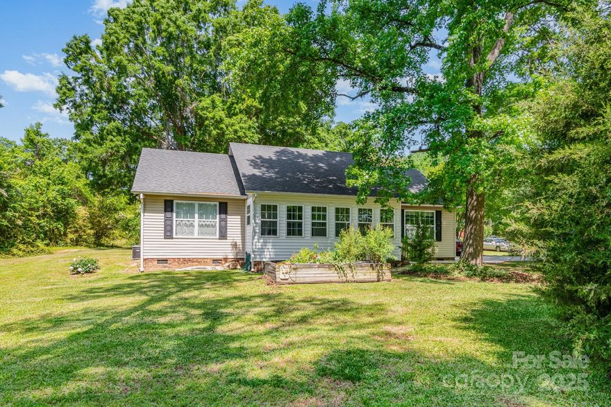 Come take a walk around this beautifully maintained 3-bedroom, 2-bathroom ranch-style home, perfectly nestled on nearly an acre of land spanning two lots. Enjoy pasture views that stretch for days, offering a peaceful sense of privacy. This charming home features an inviting sunroom and a spacious trex deck/railings off the back—ideal for relaxing, entertaining, or hosting weekend cookouts with family and friends. The open layout provides a warm and comfortable feel, while the oversized driveway ensures plenty of parking for guests, boats, or RVs.