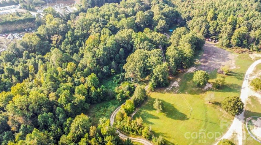 Back on the market due to no fault of the seller

Approximately 2.101 acres located at 3164 Andrew Link Road in Iron Station, just off NC Hwy 27. Property is primarily zoned residential with a small portion of the parcel extending into commercial zoning, offering flexibility for a range of potential uses. Conveniently positioned with access to surrounding areas including Lincolnton and the greater Charlotte region.

No county water or septic system currently on site. County water is available on a nearby residential parcel; buyer to verify availability, connection requirements, and associated costs with appropriate utility providers and county departments. Buyer to also verify septic suitability with county environmental health.