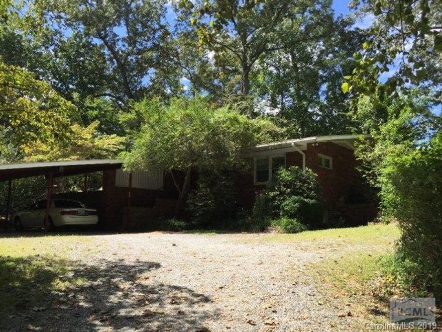 Well maintained 3 bedroom 2 bath house with privacy. Full basement allows for plenty of storage. Large deck and patio cover 3 sides of the house. Large open area allow for dining and family area. Double carport keeps you dry in bad weather. Sell your lawn mower. You can use a weed eater for the small grass yard.