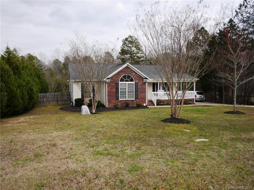 Come by to see this Ranch home with approx 1 acre, and huge fenced back yard. Home has all new carpet and all new paint. Open floor plan, kitchen island with seating, cathedral ceilings in great room and master bedroom, wrap around porch, plenty of parking, and recently upgraded HVAC. Get away from the hustle of city life and find out what quiet country living is like!