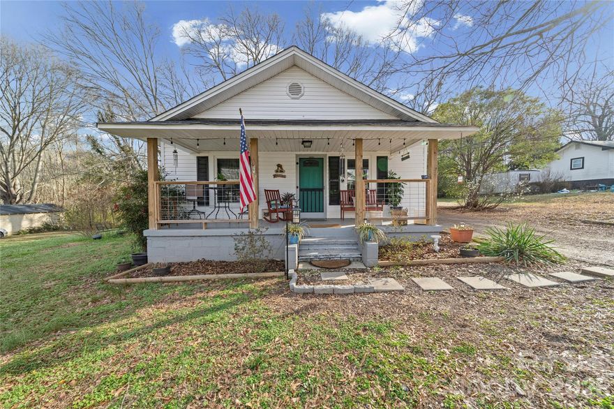 This charming 2-bedroom cottage has been meticulously maintained and is move-in ready. A remodel in 2021 by previous owners featured a new roof, exterior siding, water heater, and HVAC offering you peace of mind on big-ticket items. Inside, you'll find an abundance of natural light throughout, the coziest living room that exudes warmth, and that the thoughtfully designed layout feels much larger than it is! The kitchen table fits perfectly and will remain with the home in addition to all appliances. Outside, the large outbuilding provides ample storage, long driveway for parking, a fire pit area for relaxing and entertaining, covered porch, chicken coop, and plenty of level space to build additions. No city taxes paid, no HOA. Schedule your showing today, priced to move quickly.