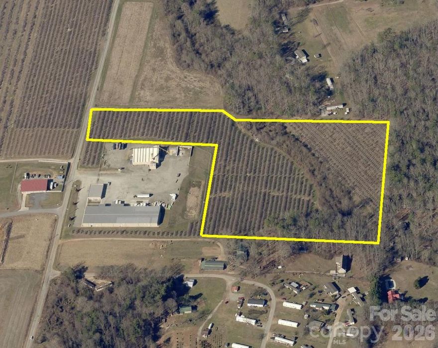 DEVELOPMENT OPPORTUNITY.  14.62 acres on McMurry Road in Flat Rock near I-26 and the new proposed Borg Warner Facility.  Level to rolling from Apple Farm.  Cleared Land.  Buyer to confirm if water & sewer on property.  Both appear to be nearby.