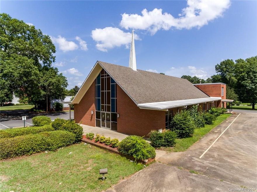 Trinity Bible Church is on the corner of highly visible, high traffic Cherry Road and Myrtle Drive and within walking distance of Winthrop College. The main building consists of approximately 10,944 s/f consisting of sanctuary, baptismal, classrooms, administration offices, restrooms, and storage rooms. Additional building of approximately 1,200 s/f consists of a kitchen, social hall, classroom and restrooms.