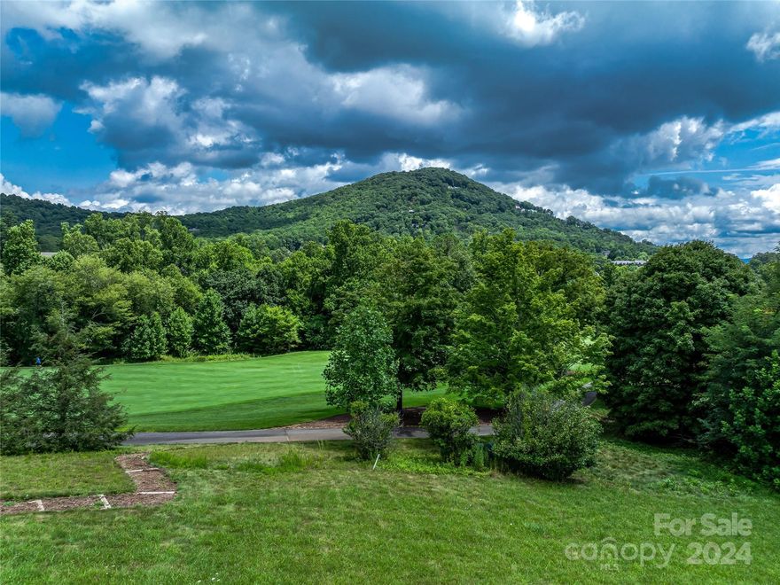 Nestled within the exclusive Cliffs at Walnut Cove, 1814 Bella Vista Court offers an unparalleled opportunity to build your dream home on a prime golf course location. Spanning approximately 2.07 acres, this homesite boasts breathtaking views of both distant and nearby mountain ranges with the Blue Ridge Parkway in sight, providing a serene and picturesque setting.

The homesite features a gentle slope with an easy build-site that maximizes the natural beauty of the surrounding landscape. Easy access to world-class amenities, including a championship golf course, wellness center, and gourmet dining.

The adjacent homesite at 1822 Bella Vista Court is also available for purchase separately, offering additional possibilities for expansion. A Club membership at The Cliffs is available for purchase with this property giving you access to all seven communities.
