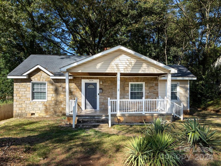 Classic bungalow less than two miles from center city Charlotte - Minutes to shopping / dining and entertainment - Westover Hills is one of Charlottes most desirable areas with easy access to I77, Uptown, Airport, etc. -  Freshly painted - Two generous bedrooms - Full bath with tub - Large living room - Kitchen with refrigerator included - Office with built ins is perfect nursery or flex space - Huge utility room with washer and dryer included - Tons of extra storage - Large level lot is perfect play area - Great opportunity to be less than 2 miles from Center City Charlotte at an affordable price point with a move in ready home!