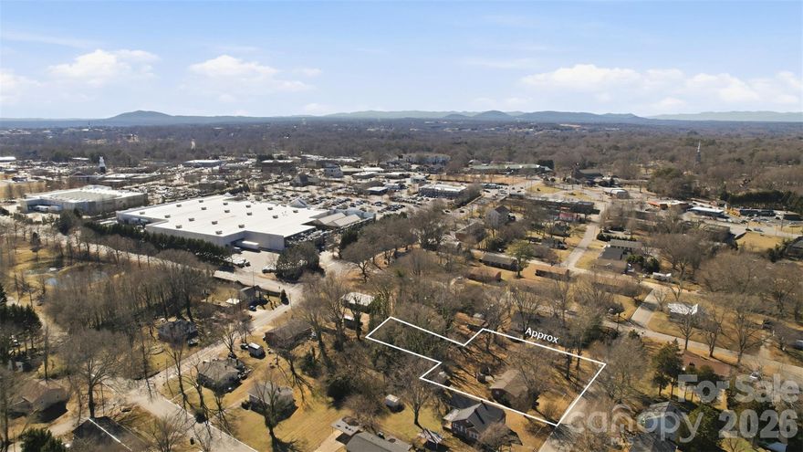 A rare opportunity in NE Hickory—this 2-bedroom, 1-bath home is being offered together with two additional vacant lots, giving buyers flexibility, privacy, and future potential in a highly convenient location. 
Enjoy comfortable single-level living with a practical layout, bright living spaces, and a cozy feel that’s ideal for first-time buyers, downsizers, or investors. Outside, a spacious back patio—complete with electric outlets—creates the perfect setup for a fire pit, hot tub, or outdoor entertaining.
What truly sets this offering apart are the two adjoining vacant lots, providing options for expansion, additional homesites, investment, or simply extra space to enjoy. Whether you’re looking to build, create a larger private setting, or hold the land for future use, this package delivers exceptional versatility.
Located in an established neighborhood close to shopping, dining, schools, and major roadways, this property offers convenience and opportunity all in one. The home is being sold AS IS.
Opportunities like this—a home plus two additional lots—don’t come along often in Hickory.