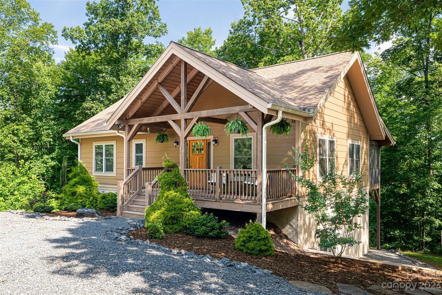 A MUST SEE! Don't miss this like new mountain home! The custom built 3 BR/2.5 BA rustic home sits in the gated community of Hidden Lake ideally located in the countryside of Western NC. Upon entering you will notice the open floorplan housing the greatroom with a stone fireplace, kitchen with large quartz countertops, quartz island and dining area.  This open living space also has hardwood flooring, gas log fireplace and tongue and groove ceilings.  The main level also hosts the spacious primary suite with attached bath and walk-in closet, laundry room and half bath.  Enjoy your morning coffee or evening tea on the tranquil screened in porch or soak up the sun by the BBQ on the back deck. The walkout lower level offers 2 addational bedrooms a full bath and large den with french doors. Take advantage of all Hidden Lake has to offer including the lake, pool, hot tub, and walking trails. Be sure watch the cinematic video to get a life like perspctive of the home and surrounding community.