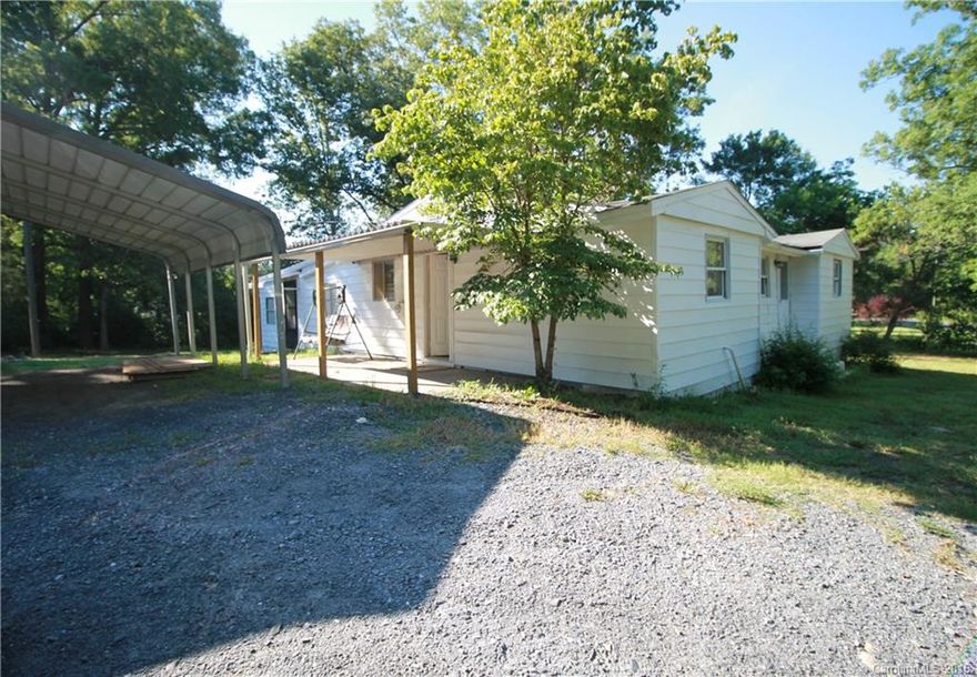 Two homes for the price of one!!! Great first time home buyer or investment opportunity! Quaint 1960's 3 bedroom/1 bath home on .89 acres in Clover, SC.  Upgrades to home include new HVAC/ductwork, new flooring, new roof, fresh paint throughout and updated bathroom. Also included is a 2 bedroom/1.5 bath 14X70 single wide mobile home. Property being sold "AS IS.