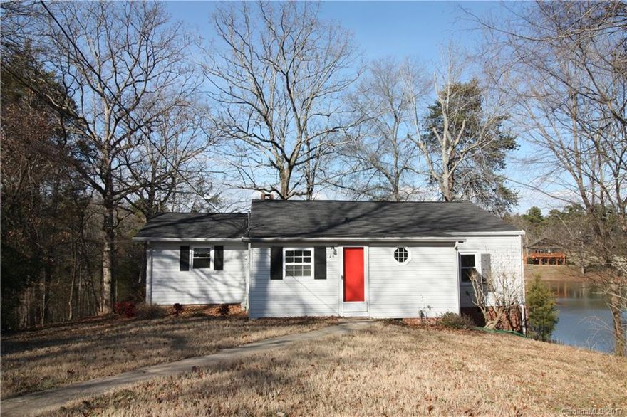 Fall in love with this 1950's lakefront cottage style home! Located at the end of a private road, this home provides all the privacy one could want.  Enjoy the beauty of the 6 acre lake from the huge sun room, the master bedroom, or while relaxing on the deck or around the yard. Per seller a dock CAN be built.  Motorized boats are not allowed on the lake however electric motor boats are allowed. Plenty of land here for a summer garden! One of the sellers is a licensed real estate agent.