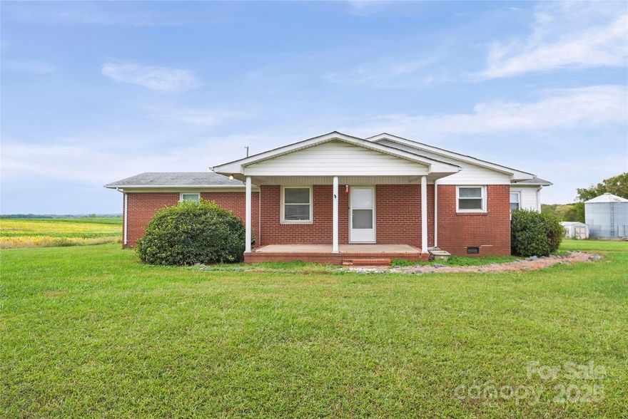 Looking for that piece of country paradise located on 1.37 acres? This beautiful home features 3 bedroom and 2 full baths. Don't let the age of the home fool you! It was remodeled several years ago and is move in ready or can be redone to fit your needs. Come enjoy a nice rocking chair on the front porch and enjoy the great country views.  Home has central heat and air. Location is close to Hwy 74 and easy access to the Monroe bypass. This 1.3 acres has been surveyed from a larger tract of land. Tax value has not been determined.