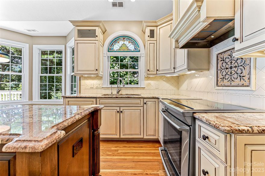 This stunning 4 bedroom townhouse has mountain views, primary bedroom on the main level and a second primary on the lower level. The primary ensuite bathroom has a jetted garden tub and custom cabinets. The heart of the home is the designer kitchen equipped with Electrolux Induction range and a convection oven. The Liebherr dual compressor refrigerator and Kitchen Aid dishwasher are cabinet faced blending in with the beautiful custom cabinets. The attached breakfast nook is wrapped with windows. Newly added plantation shutters throughout the main level. In addition to the captivating interiors, this condo has a two-car garage, Rinnai tankless water heater, Carolina Crawl Space encapsulation system, radon mitigation system, security system, and Mul-T-Lock keys. Limb some trees in the back for a more amazing view. Perfectly nestled in a charming gated community located in a desirable South Asheville area. Due to unforeseen medical issues, sellers are having to sell their dream home.