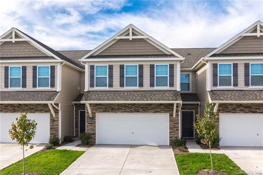 Like-new townhouse with open floor plan in Summerlake. Upgraded kitchen with granite & SS appliances. Hardwoods throughout main level. Three spacious bedrooms up plus large loft/rec area. Premium lot overlooks the lake. Great Ft Mill location. Main floor built-in desk and mudroom. Summerlake HOA is $125/month plus $170/quarter for Regal Manor amenities.